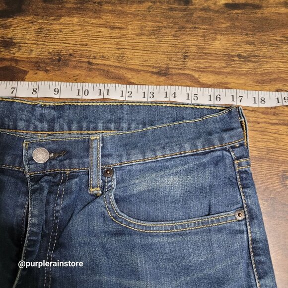 Levi's Jeans 34x32 measures 34x30 Taper Fit Medium Dark Wash Stretch Denim - Picture 7 of 12